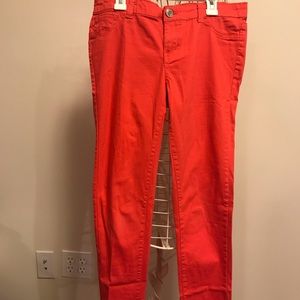 Orange skinny jeans